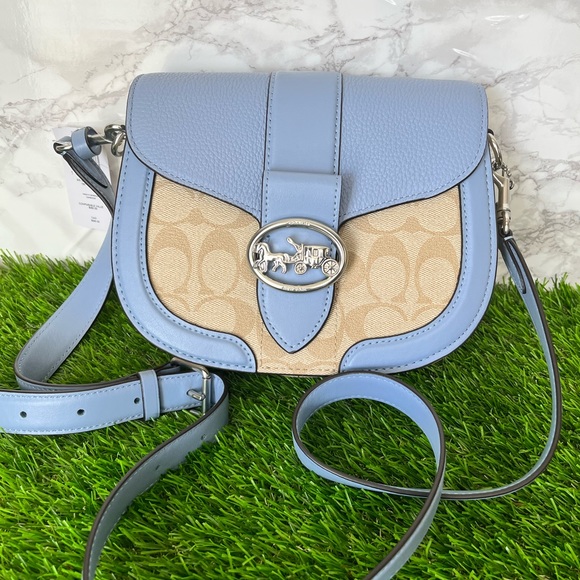Coach Handbags - NWT💙Coach Georgie Saddle Bag In Signature Canvas Light Khaki / Marble Blue